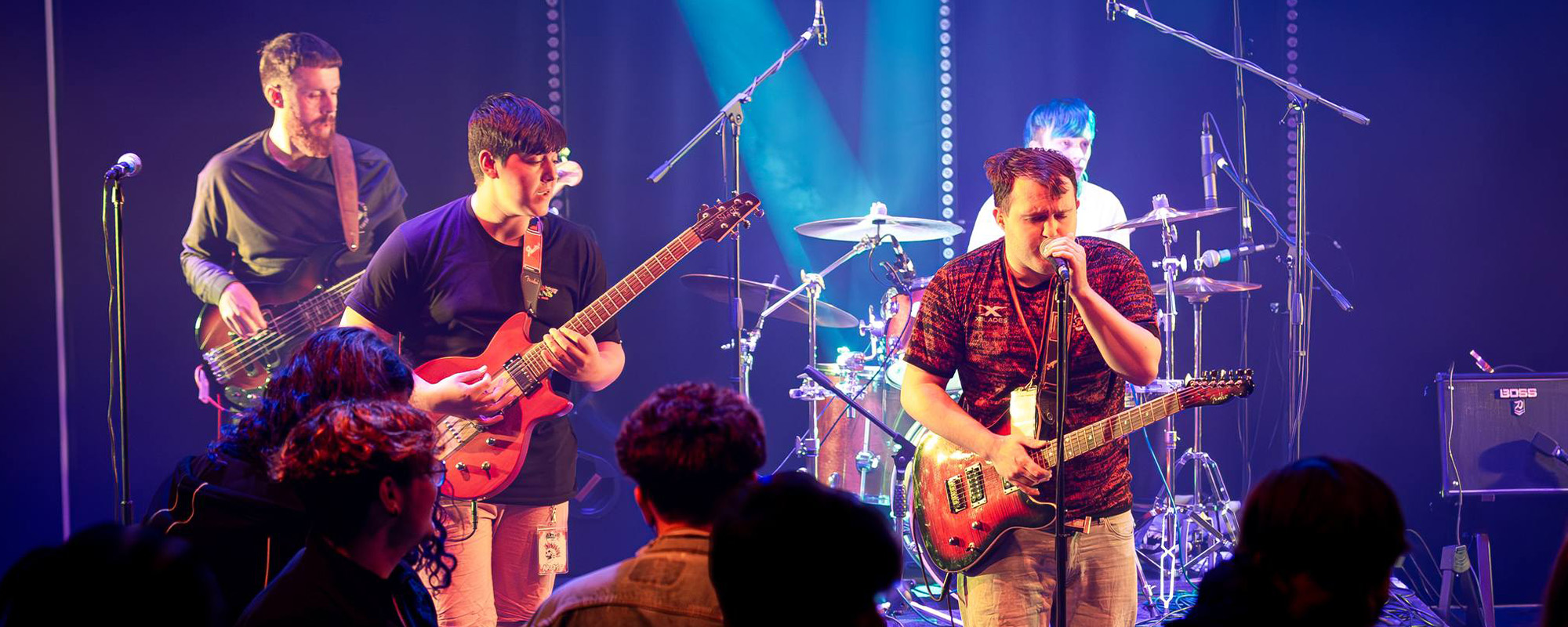 Photo of students performing at the Upload music festival