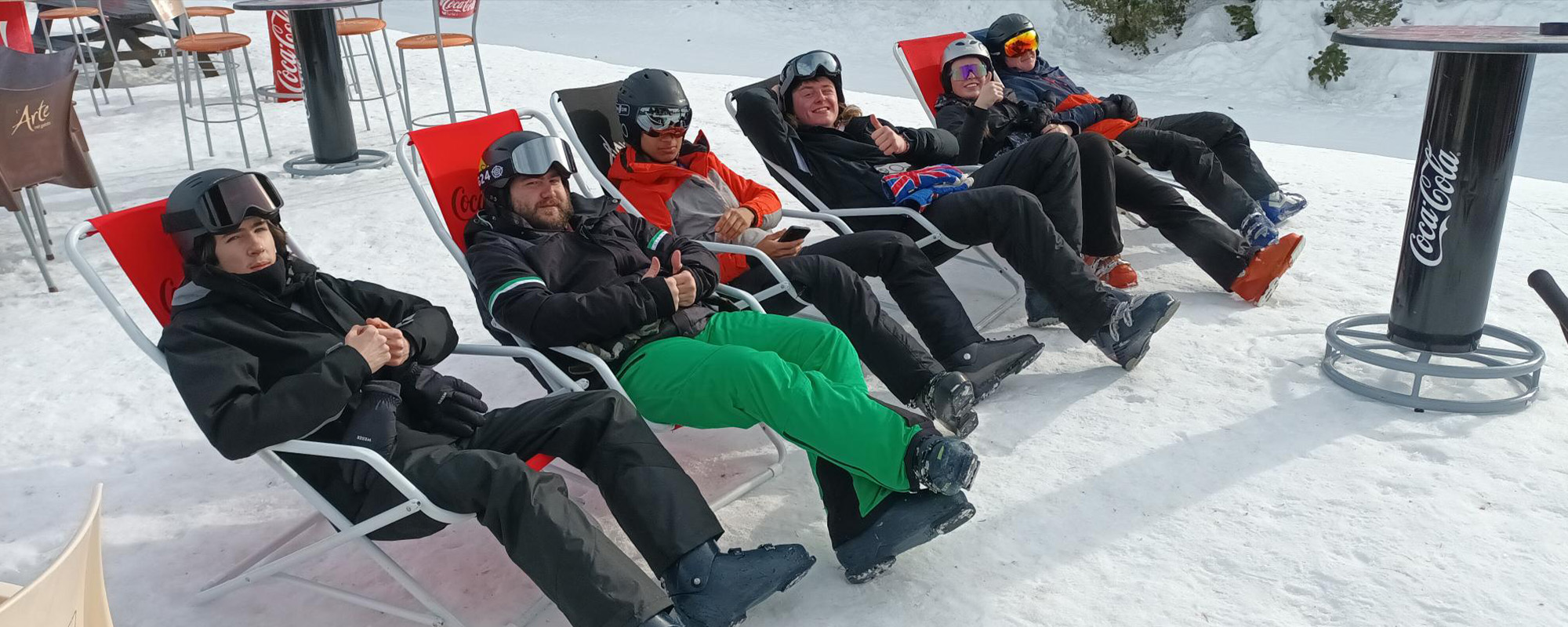 Students relaxing on their ski trip