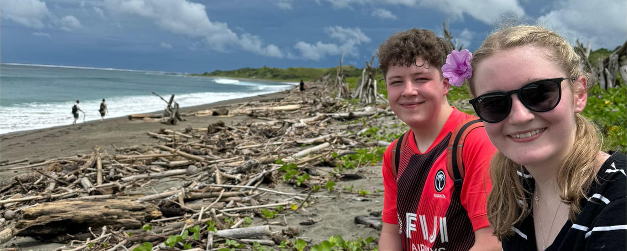 Students by the beach in Fiji