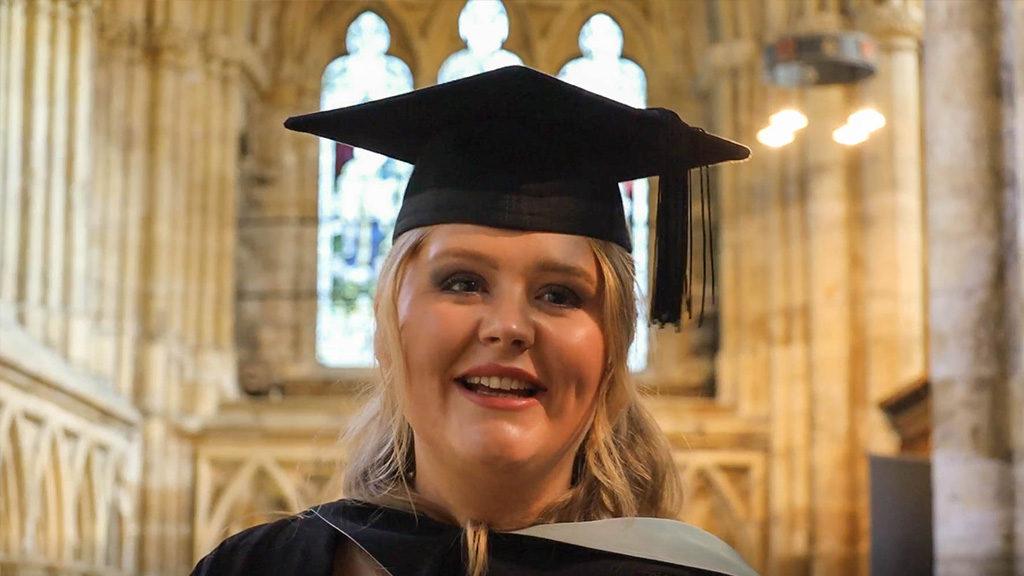 Student Keely at her Graduation ceremony