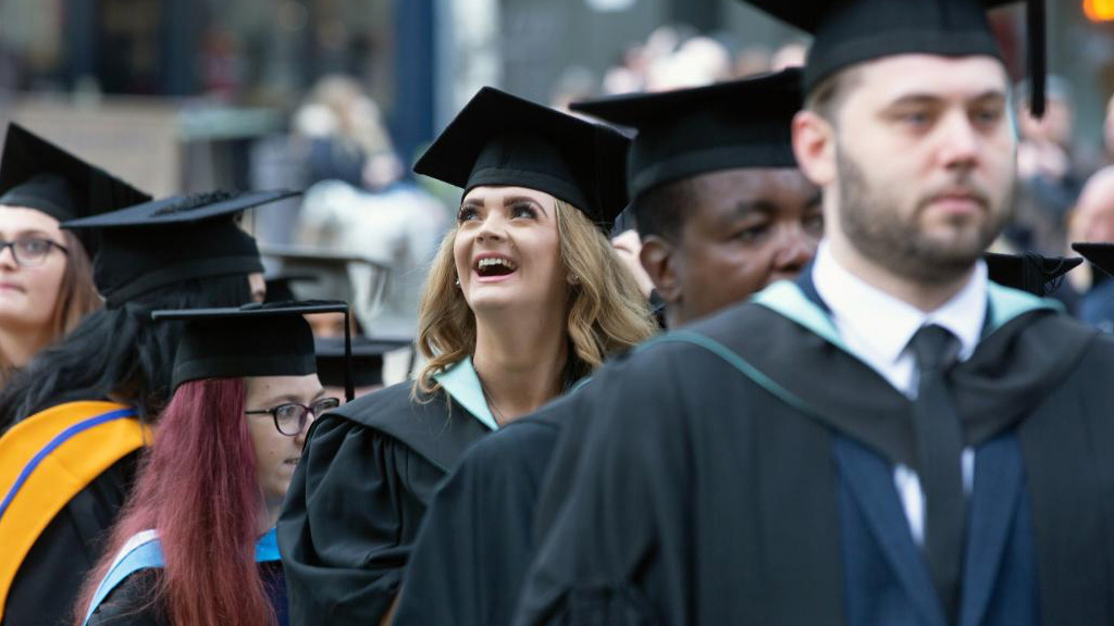 Graduates parading through Wakefield City Centre