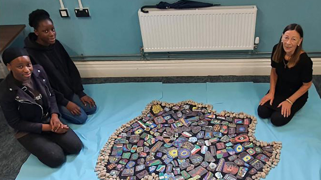 ESOL students painted over 200 individual slates