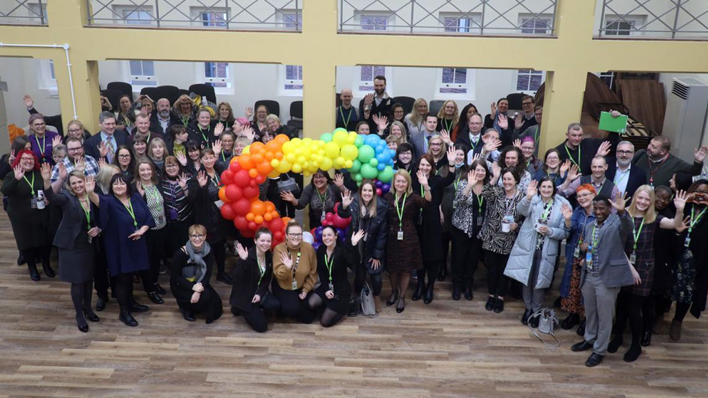 Staff from Wakefield College celebrate the on merger day