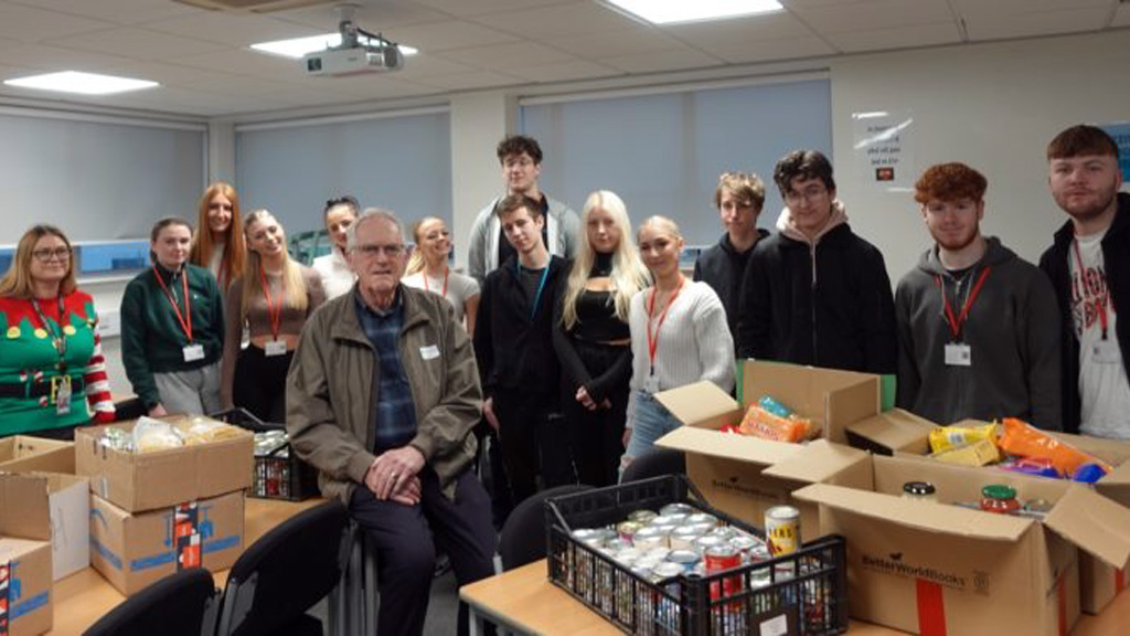 Students collecting food boxes