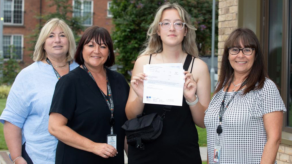 T Level student Layla Gibson celebrates with College staff