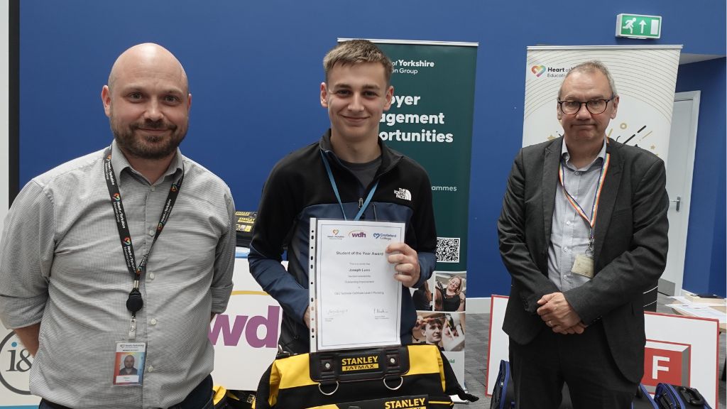 Construction student recieving award 