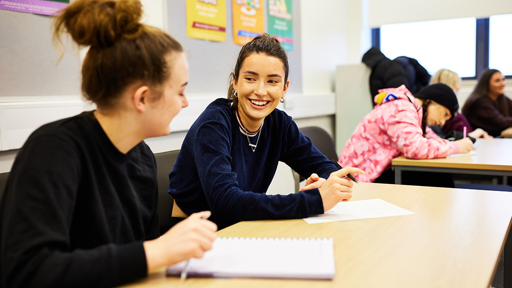 Students smiling in classroom