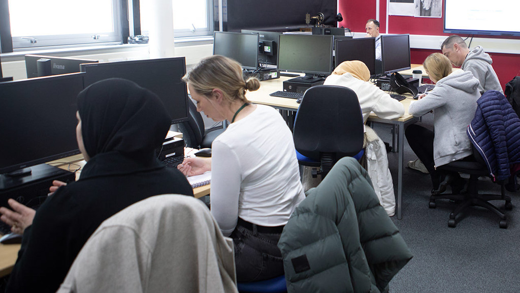 A classroom of students using computers