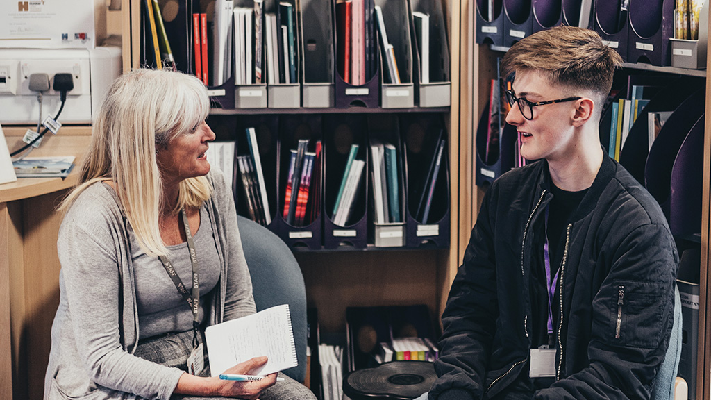 A student getting guidance from one of our advisors