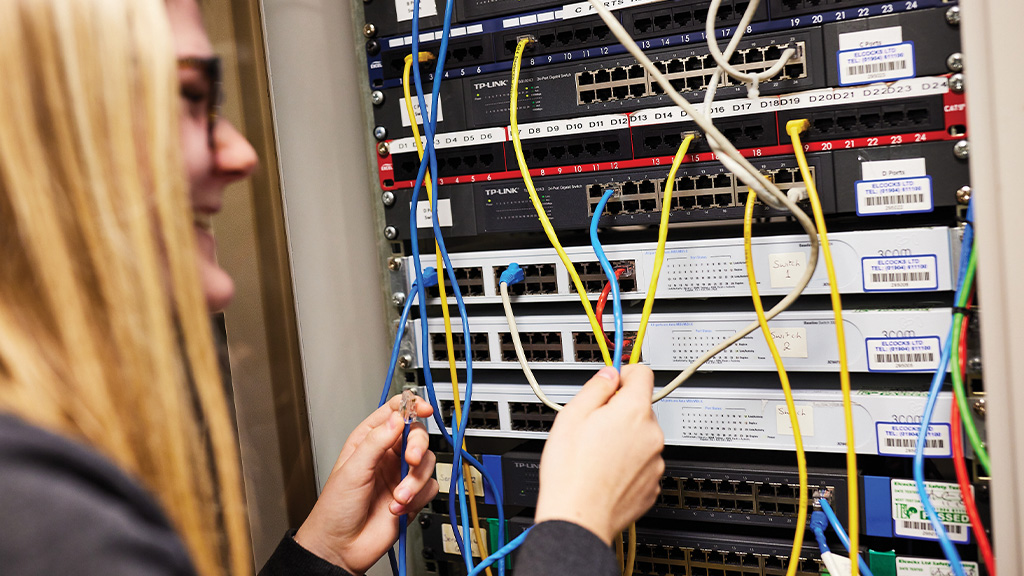 Student working on a server