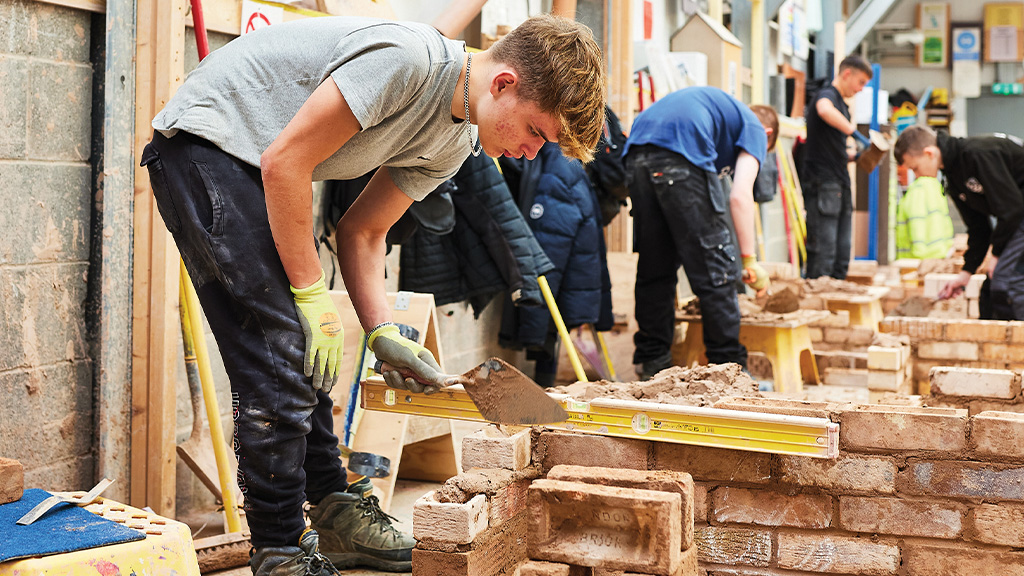 Student practising bricklaying skills