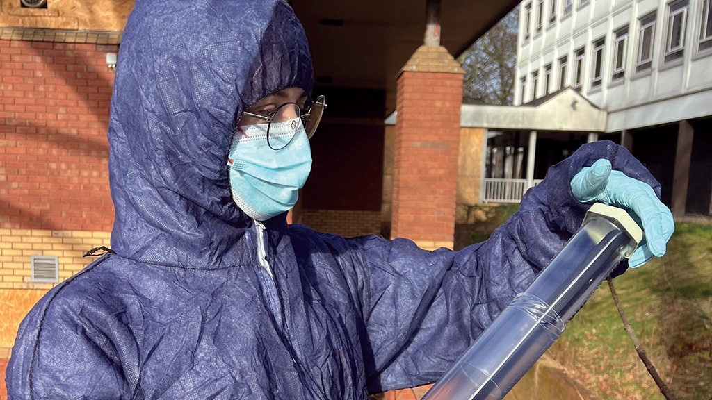 Student carrying out crime scene investigation